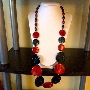 NEW. Coiris Long Acrylic Burgandy / Black Necklace